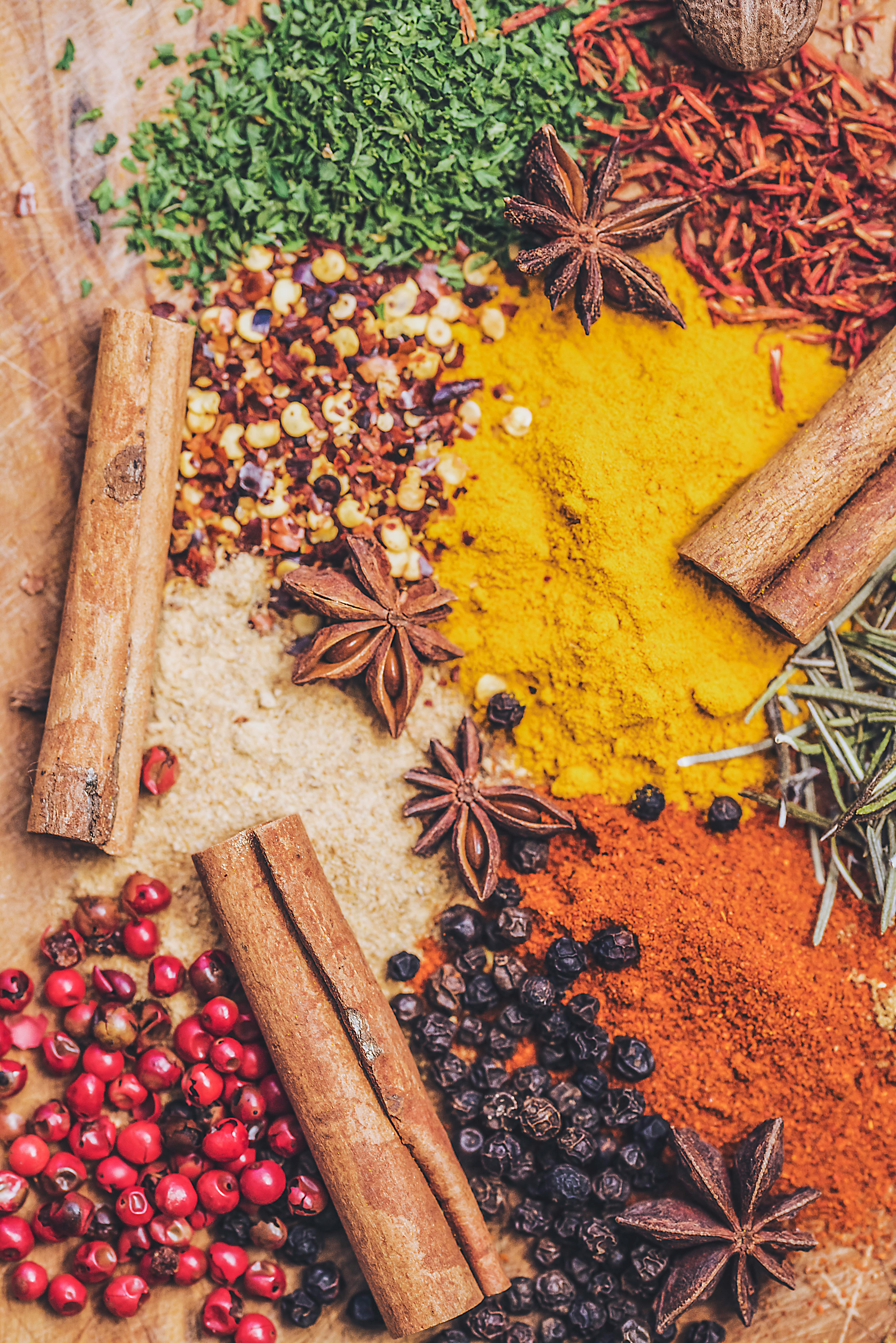 Fresh herbs and dried spices arranged for grading